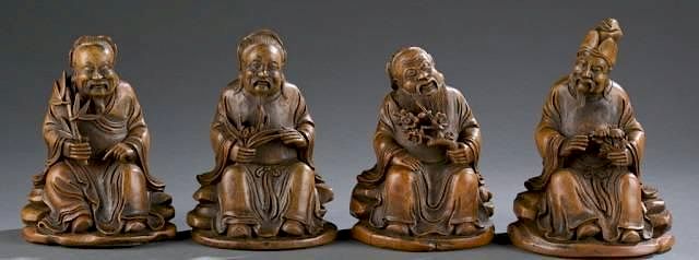 Appraisal: Group of Chinese carved bamboo scholars A group of Chinese