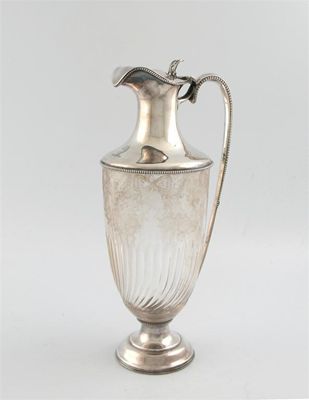 Appraisal: An Edwardian silver mounted cut glass claret jug by The