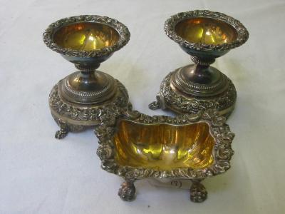 Appraisal: A PAIR OF FRENCH CIRCULAR SALTS with leaf and scroll