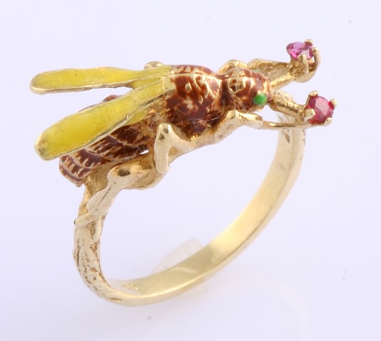 Appraisal: KY wasp Enamelled ring with ruby accents One broken prong