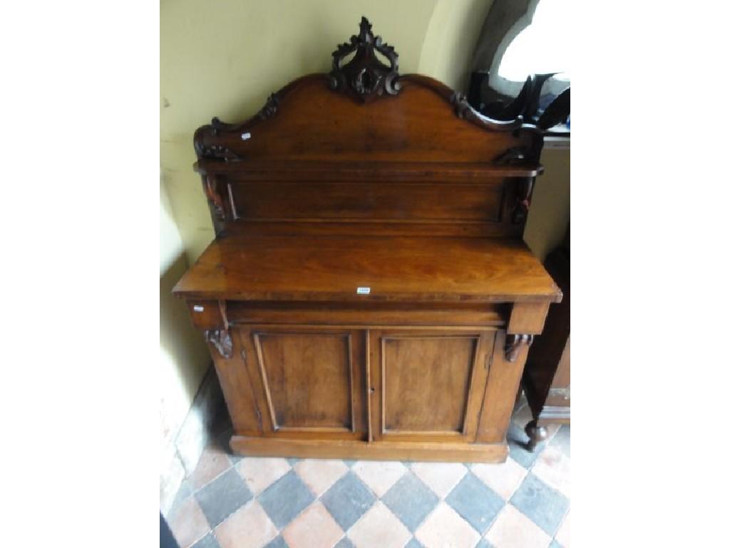 Appraisal: A Victorian mahogany chiffonier the raised panelled back with shaped