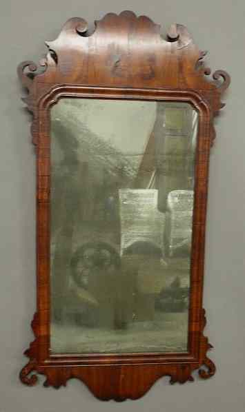 Appraisal: Chippendale mahogany mirror c with a carved crest and ears