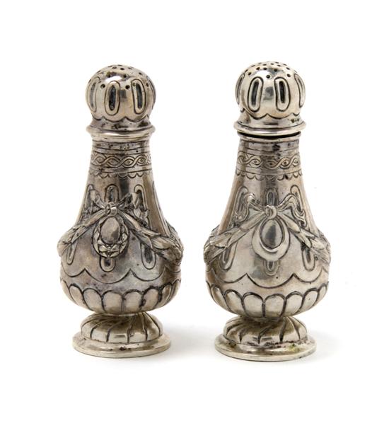 Appraisal: A Pair of German Silver Casters Height inches