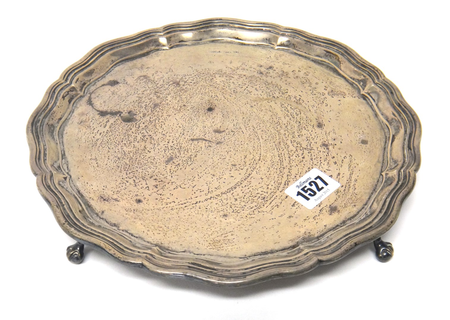 Appraisal: A silver shaped circular salver having a pie-crust rim raised