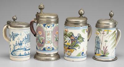 Appraisal: Four Delft tankards all with hinged pewter lids one with