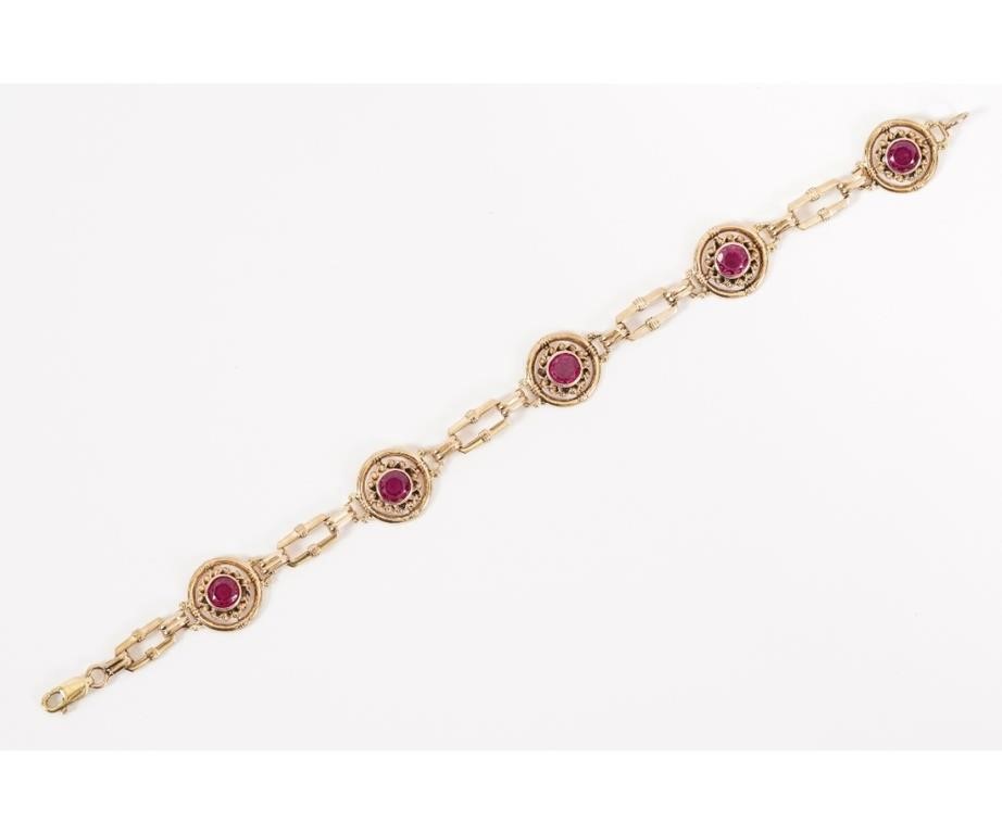 Appraisal: k yellow gold bracelet consisting of five mm round synthetic