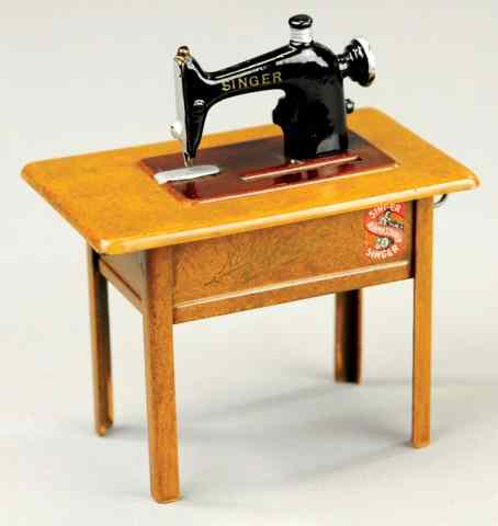 Appraisal: SINGER ELECTRIC SEWING MACHINE STILL BANK Germany c 's made