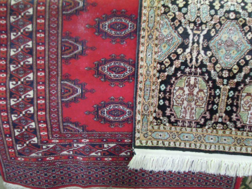 Appraisal: A Bokhara style carpet with a central panel interspersed with