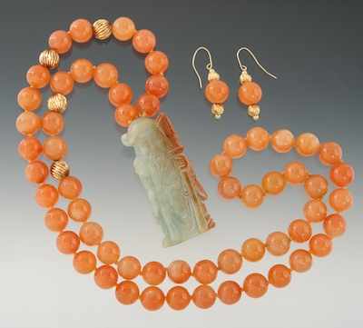 Appraisal: A Large Carnelian Bead and Jade Pendant Necklace and Matching