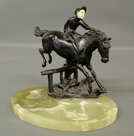 Appraisal: - Austrian bronze of a jockey and rider with carved