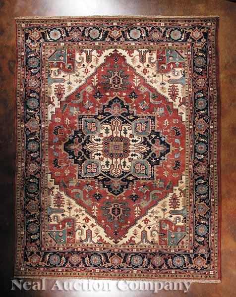 Appraisal: A Fine Persian Serapi Carpet red and camel ground central