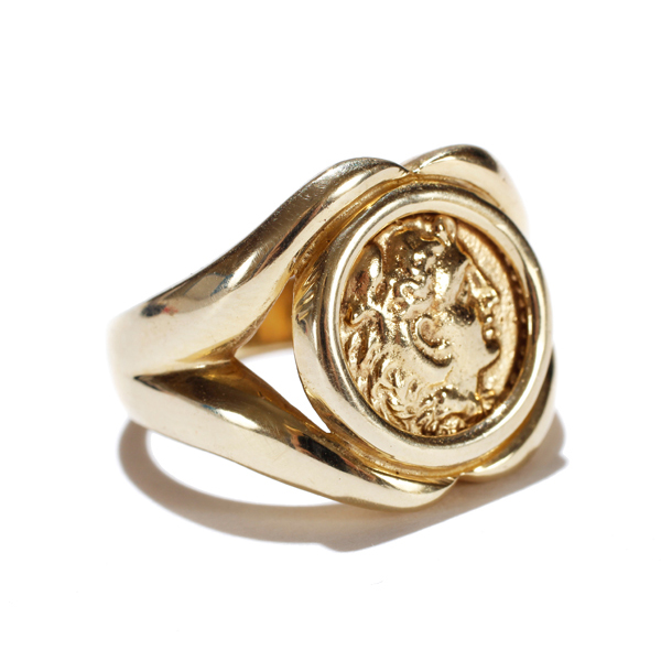 Appraisal: Gold K fashion ring with cameo coin design medallion Marked