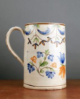 Appraisal: English Creamware Tankard thc Of tapering cylindrical form with applied