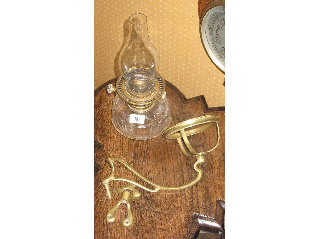 Appraisal: Oil lamp with brass wall bracket