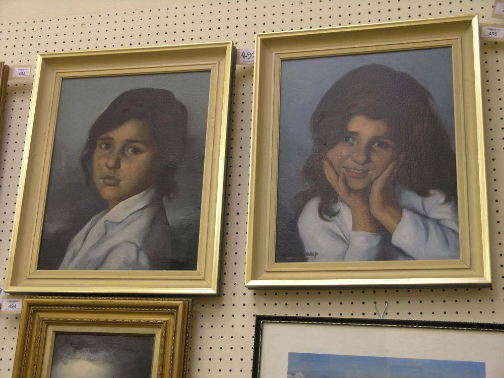 Appraisal: Juan Arroyo - pair of oils on canvas portrait busts