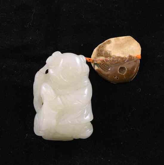 Appraisal: A Chinese white jade figure of a boy th century