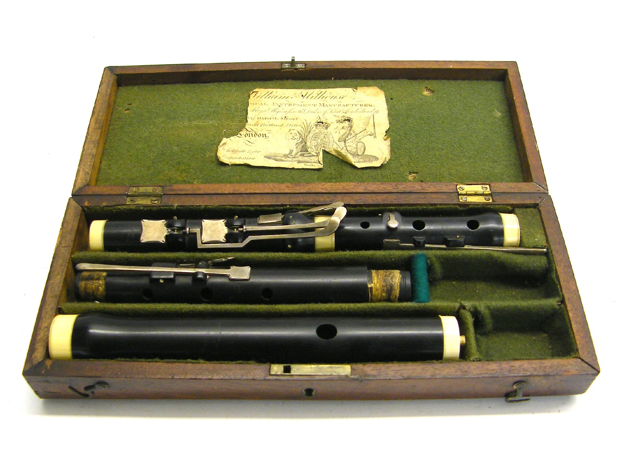 Appraisal: English ebony and ivory mounted eight keyed flute by and