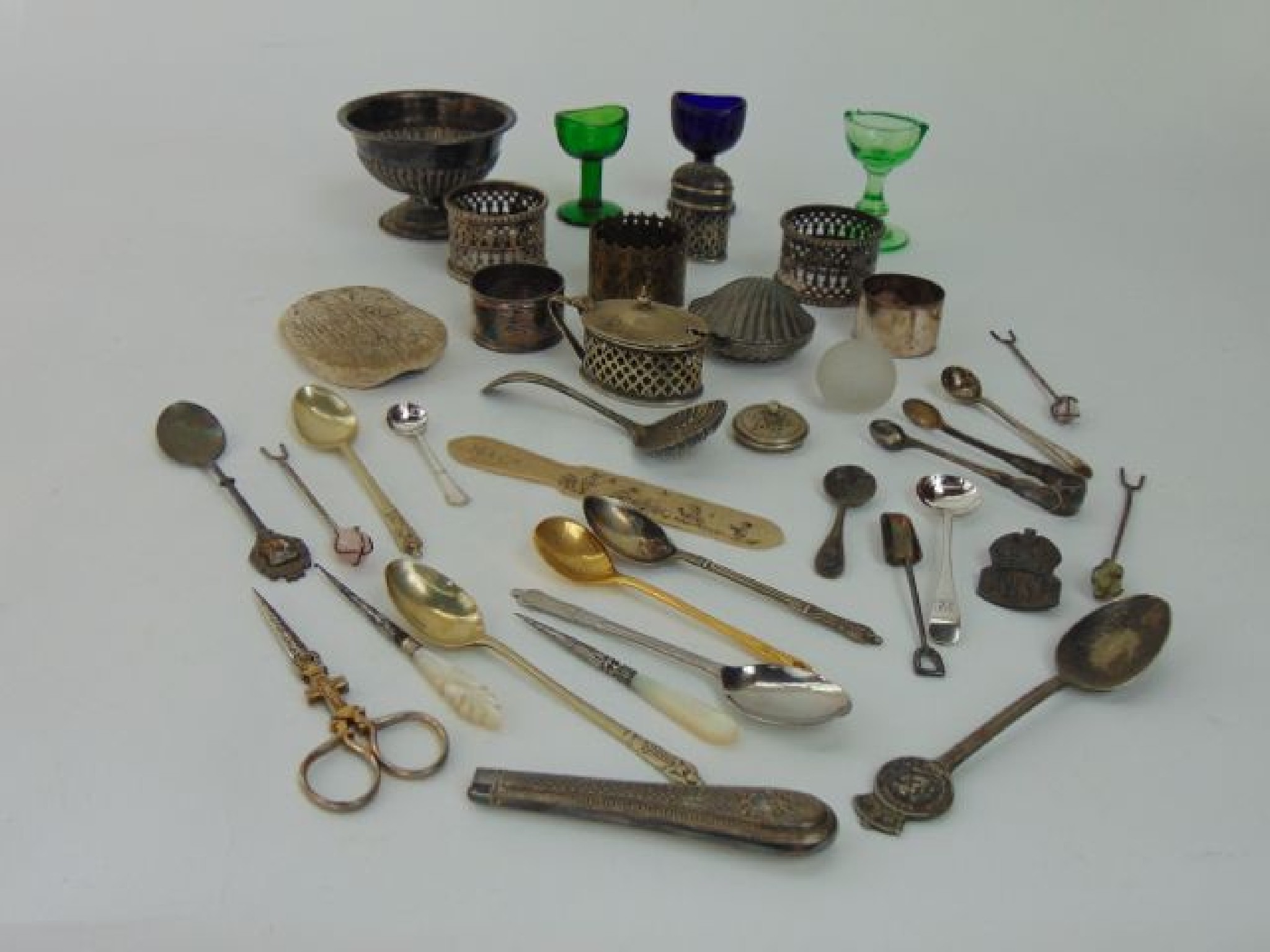 Appraisal: A collection of small plated items including spoons casting spoon