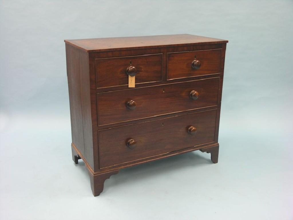 Appraisal: A small Victorian mahogany chest cross-banded top above two short