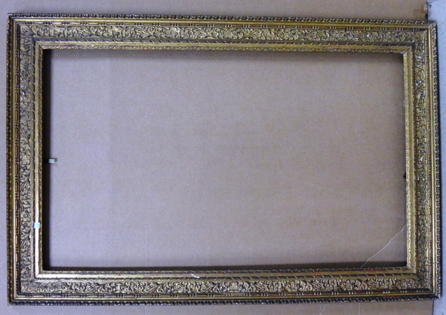 Appraisal: A th century carved and plaster gilt frame the aperture