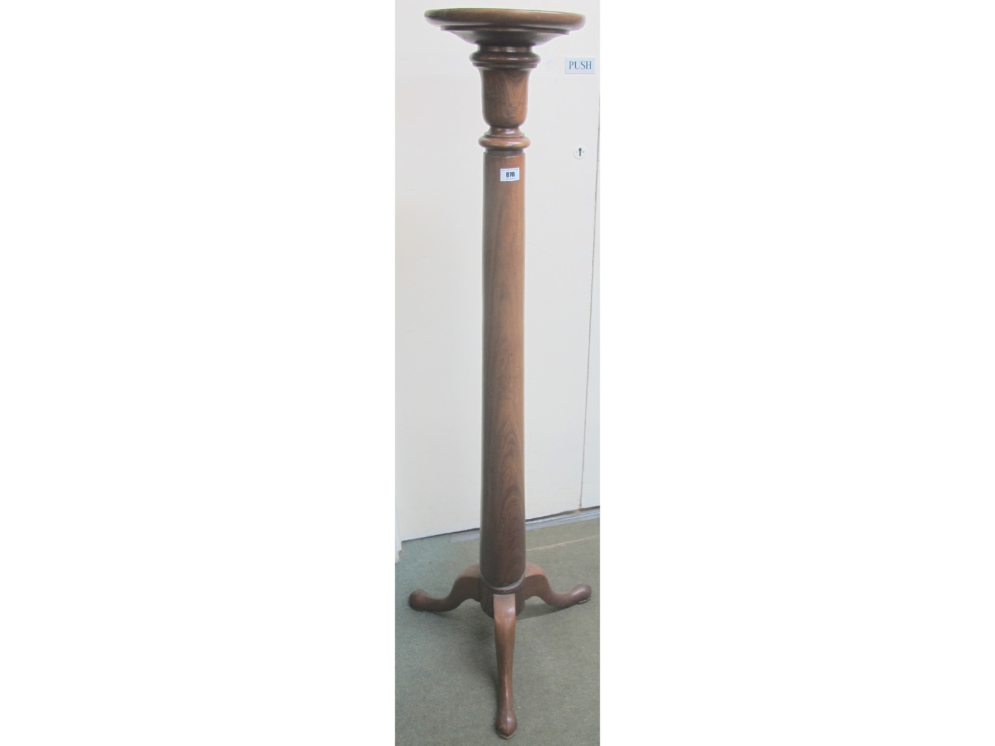 Appraisal: A tripod mahogany torchere