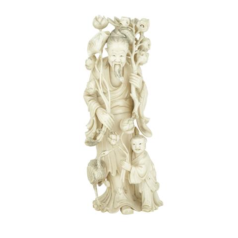 Appraisal: Carved Ivory Chinese Figure with Lotus Blossoms Circa Finely rendered