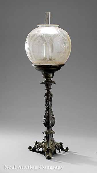 Appraisal: An American Rococo Patinated Brass Solar Lamp mid- th c