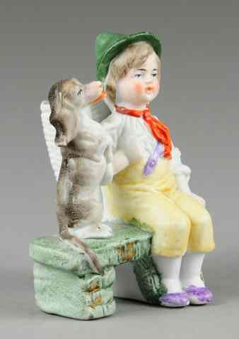 Appraisal: SEATED CHILD WITH DOG TOOTHPICK HOLDER Bisque c 's well