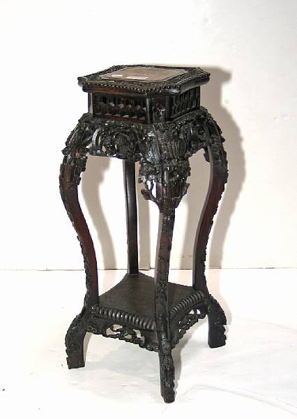 Appraisal: Two carved wood plant stands with marble-inset tops Late th