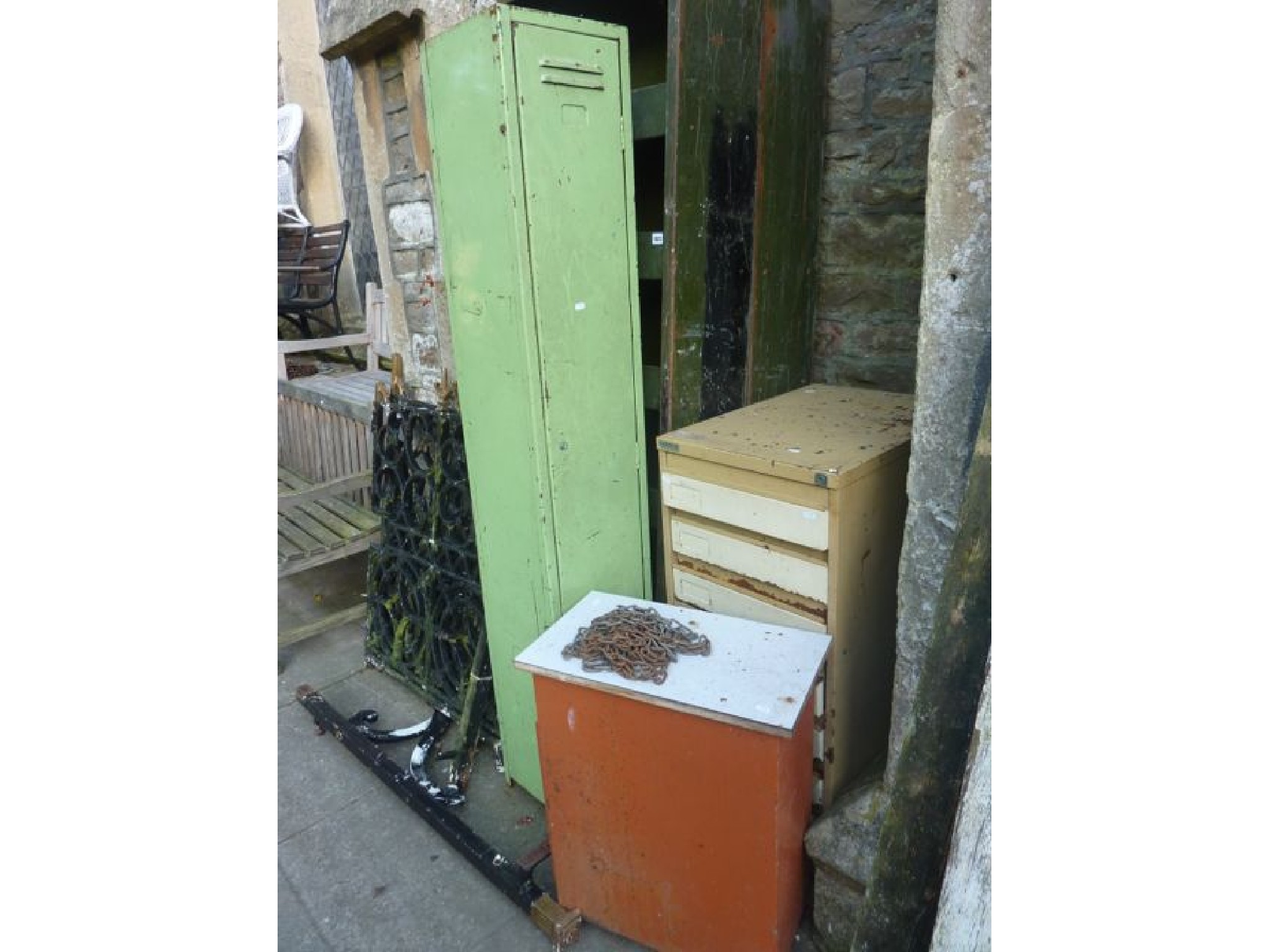 Appraisal: A pair of industrial green painted steel freestanding storage shelves