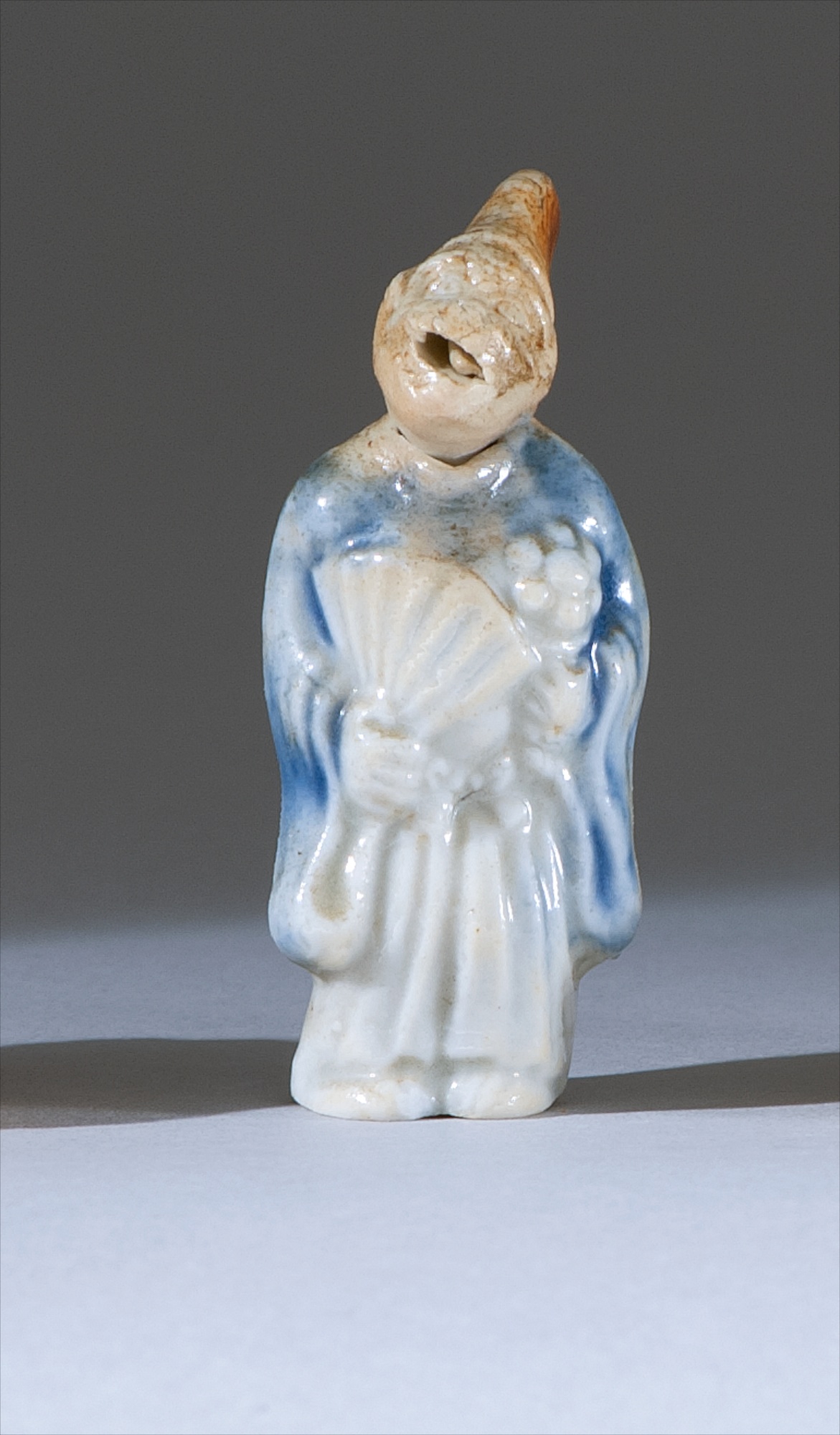 Appraisal: HIRADO PORCELAIN NETSUKE th CenturyIn the form of a monkey