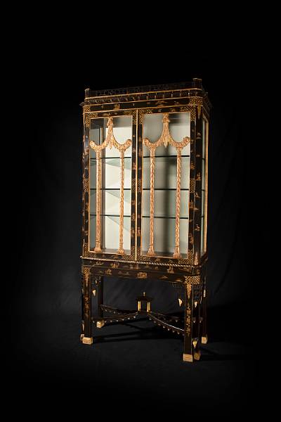 Appraisal: A Chinese Chippendale style black lacquered and chinoiserie display cabinet