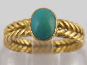 Appraisal: A yellow metal tests ct gold and turquoise ring with