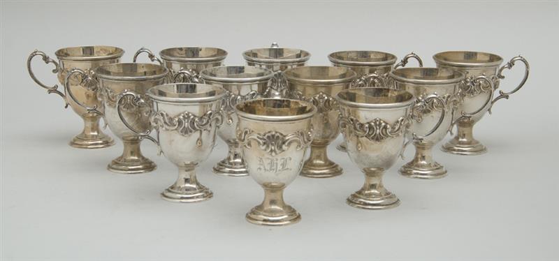 Appraisal: RICHARD WALLACE SET OF TWELVE SILVER MONOGRAMMED PUNCH CUPS Each