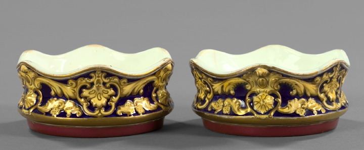 Appraisal: Pair of Italian Parcel-Gilded Blue Yellow and Claret Majolica Magnum