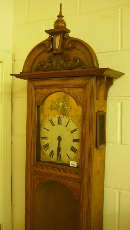 Appraisal: Early th century oak two train longcase clock with arched