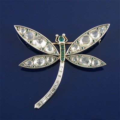 Appraisal: A diamond and emerald dragonfly brooch the wings set with