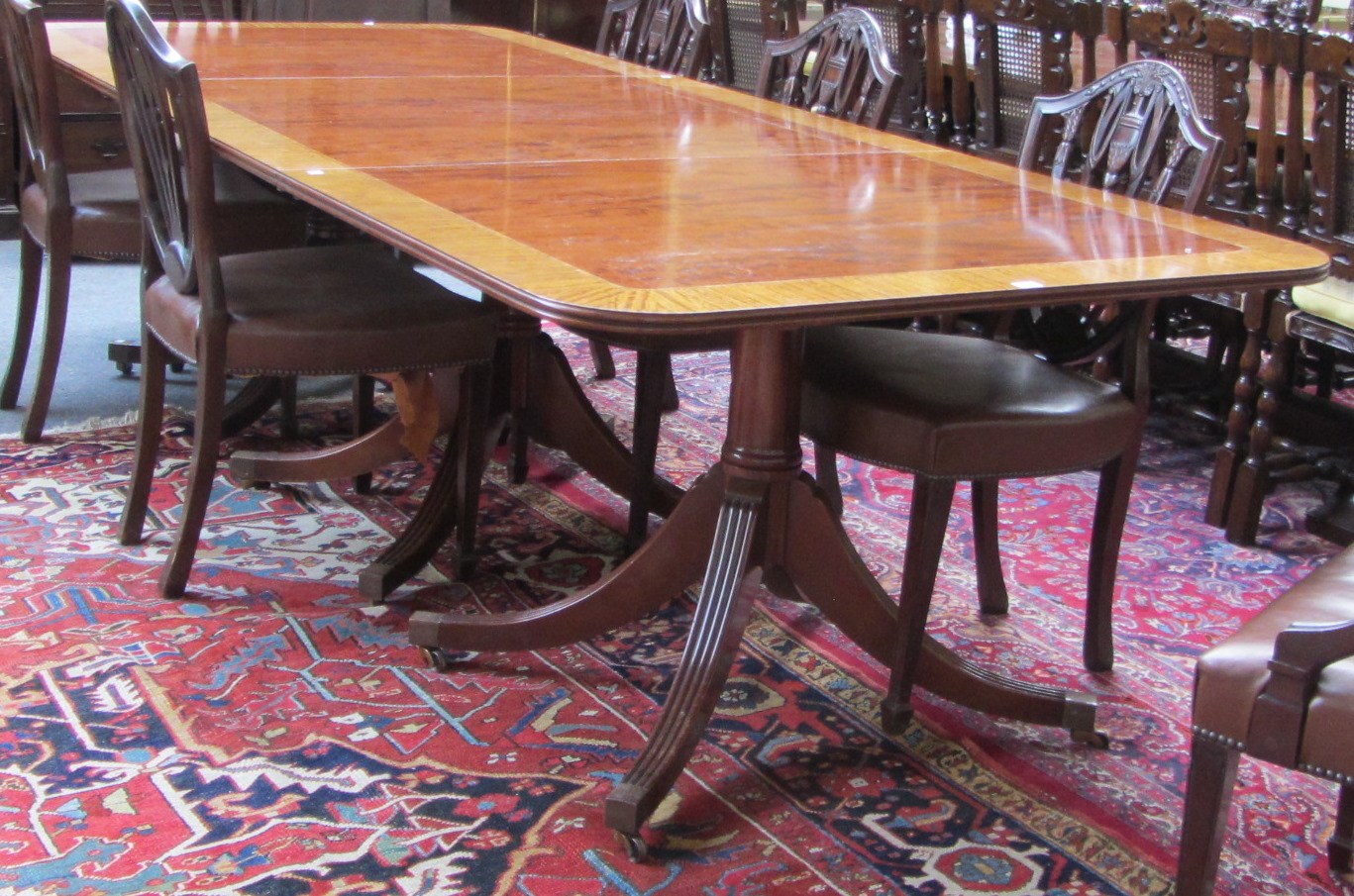 Appraisal: A George III design mahogany triple pedestal dining table on