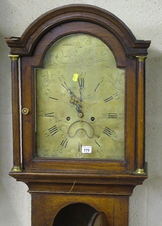 Appraisal: Oak eight day longcase clock the brass arched dial signed