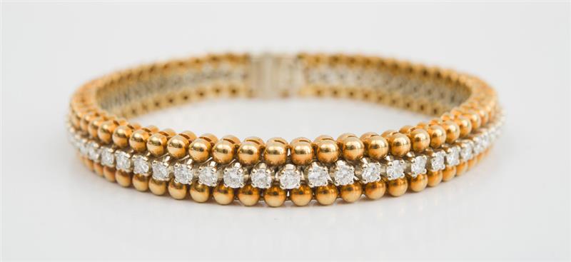 Appraisal: CARTIER K YELLOW GOLD AND DIAMOND BRACELET Set with round