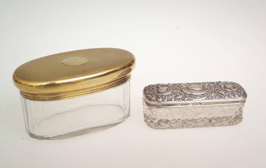 Appraisal: GEORGE V SILVER-GILT TOPPED DRESSING TABLE JAR MAPPIN WEBB LONDON