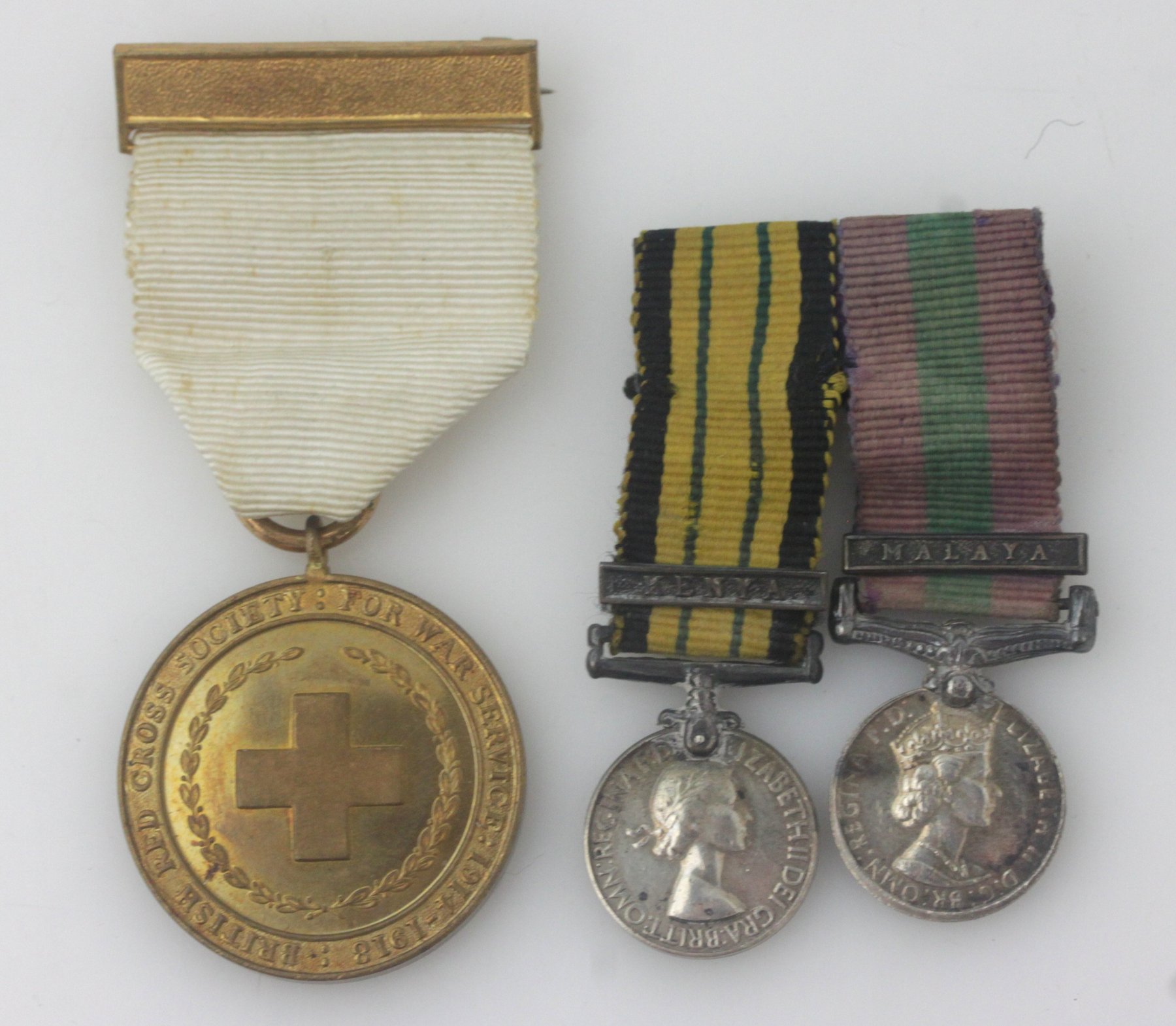 Appraisal: A Kenya Mahaga miniature medal and a British Red Cross