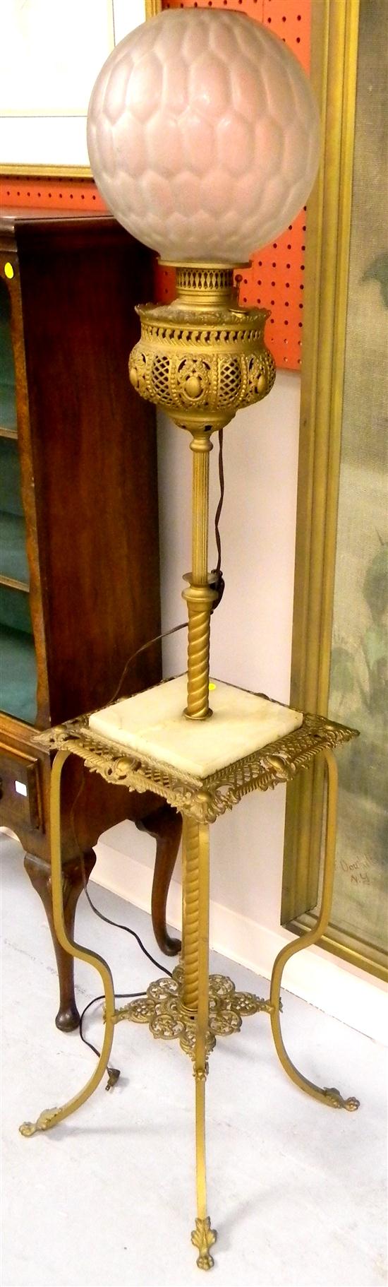 Appraisal: Electrified banquet lamp on brass base with inset marble shelf