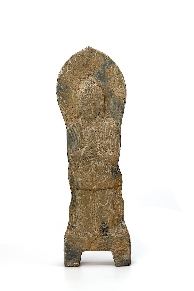 Appraisal: Carved Stone Figure of Buddha Carved standing wearing a plain