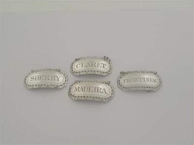 Appraisal: A set of four George III Irish canted oblong wine