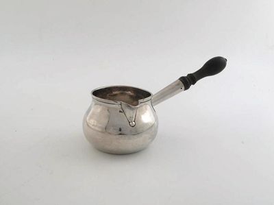 Appraisal: A George II brandy saucepan with a squat bellied bowl