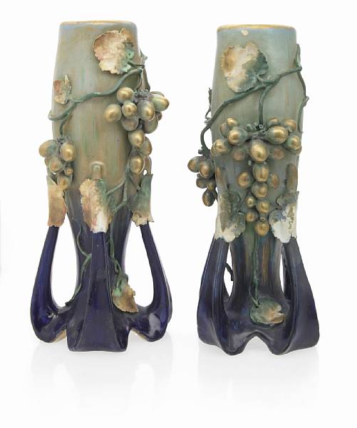 Appraisal: A pair of Amphora Art Nouveau glazed earthenware Edda vases