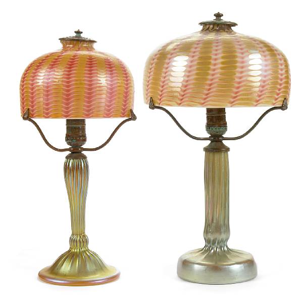 Appraisal: A set of two decorated iridescent glass table lamps height