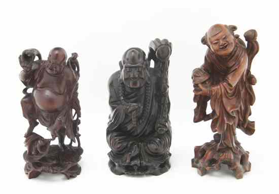 Appraisal: A Group of Three Chinese Carved Wood Figures depicting two