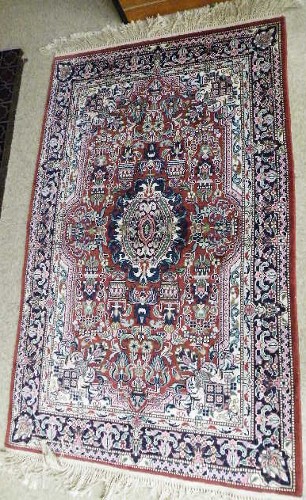 Appraisal: TWO KASHMIRI AREA RUGS floral and central floral medallion design